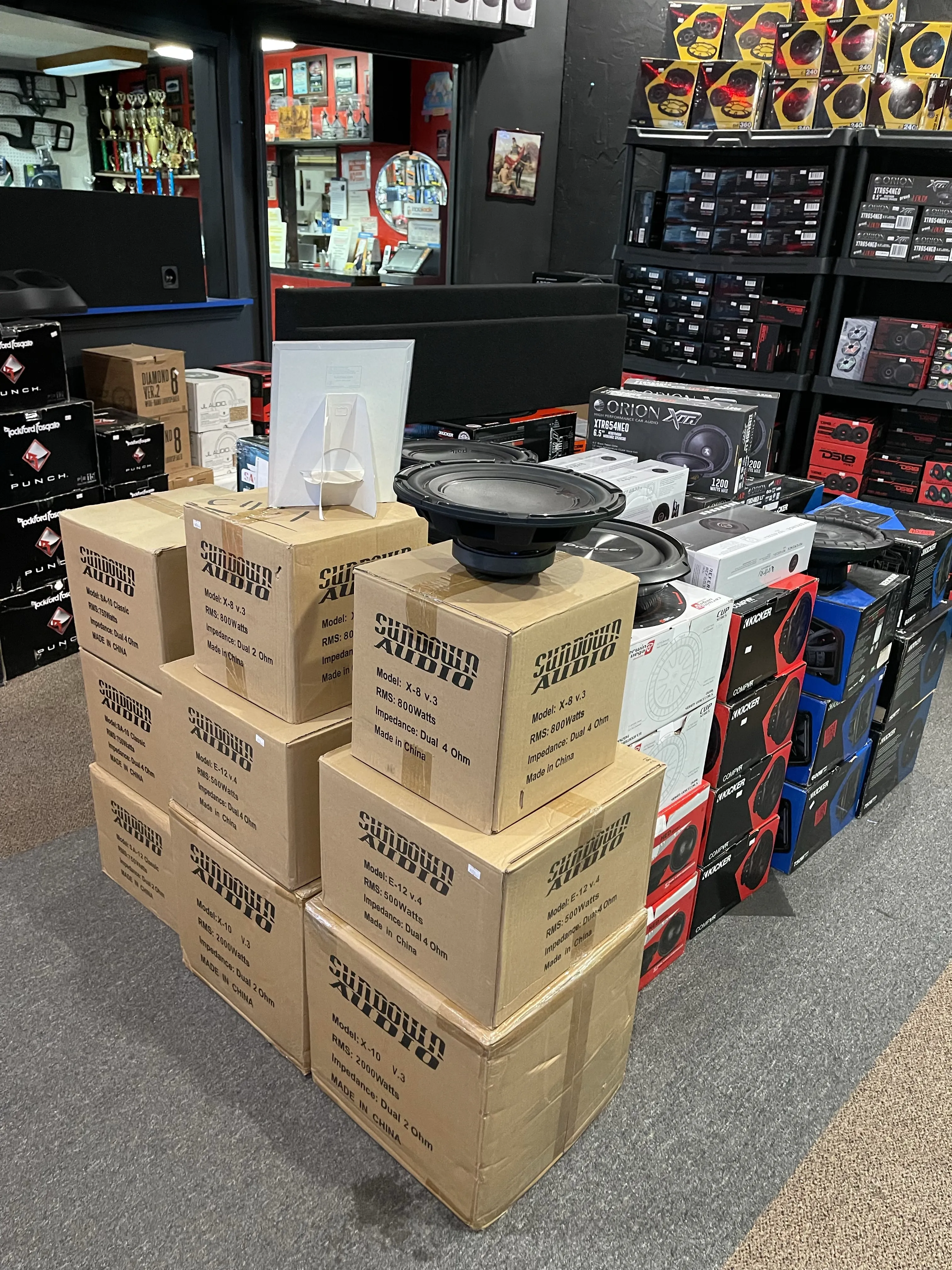 Store view showing multiple stacks of audio products.