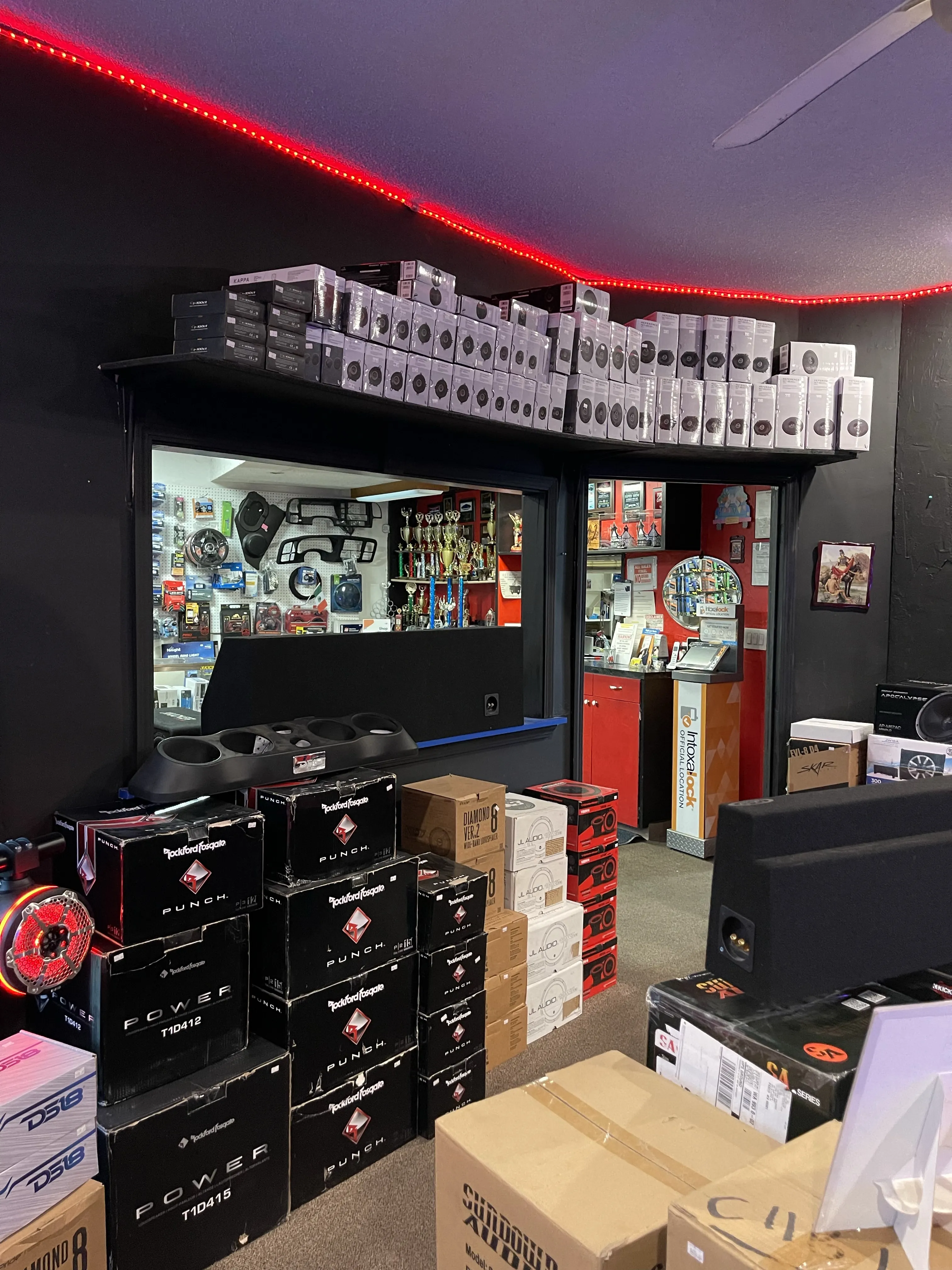 Store view showing multiple stacks of audio products.